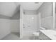 Bathroom with stylish black and white tile floors and a shower-tub combo at 104 Fairwind Ct, Fort Mill, SC 29708