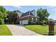 Spacious attached garage with ample parking space and a well-manicured lawn, adding convenience and appeal at 104 Fairwind Ct, Fort Mill, SC 29708