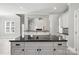 Kitchen island features black granite countertops and smooth cooktop at 104 Fairwind Ct, Fort Mill, SC 29708