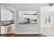 Open kitchen concept featuring white cabinets and granite countertops, perfect for entertaining and everyday living at 104 Fairwind Ct, Fort Mill, SC 29708