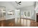 Inviting living room with hardwood floors, and open access to the kitchen at 104 Fairwind Ct, Fort Mill, SC 29708