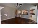 Cozy living room with fireplace and an open view to the kitchen at 104 Fairwind Ct, Fort Mill, SC 29708