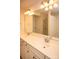 Bright bathroom featuring double sinks, large mirror, and separate shower at 10433 Blairbeth St, Charlotte, NC 28277
