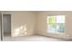 Carpeted bedroom with a door and window at 10433 Blairbeth St, Charlotte, NC 28277