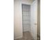 Walk-in closet features shelving for ample storage at 10433 Blairbeth St, Charlotte, NC 28277