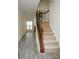 Entry featuring stairs with wood and wrought iron railing at 10433 Blairbeth St, Charlotte, NC 28277