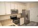 Well-equipped kitchen with stainless steel appliances, granite counters, and neutral cabinets at 10433 Blairbeth St, Charlotte, NC 28277