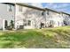 Townhome backyard with patio, grill and green space at 1133 Streamside Ln, York, SC 29745
