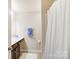 Bathroom featuring a vanity, towel rack and shower with curtain at 1133 Streamside Ln, York, SC 29745