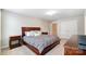 A cozy bedroom featuring bedside tables and a neutral color palette for a restful and inviting space at 1133 Streamside Ln, York, SC 29745