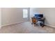 Bright bedroom featuring a desk setup by the window, carpeted flooring and neutral colors, ideal for work or study at 1133 Streamside Ln, York, SC 29745