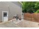 Backyard area featuring an outdoor water feature with a privacy fence at 122 Laurel Glen Dr, Mooresville, NC 28115