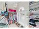Well-organized walk-in closet with ample shelving and natural light from the window at 122 Laurel Glen Dr, Mooresville, NC 28115