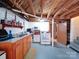 Functional basement kitchen includes a sink, oven, and storage, making meal prep easy in a unique and versatile space at 1614 Linwood Rd, Gaston, NC 28052