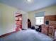 Bedroom leading to kitchen, showcasing ample natural light and storage possibilities at 1614 Linwood Rd, Gaston, NC 28052