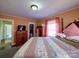 Cozy bedroom featuring a decorative quilt, vintage furniture, and closet, creating a comforting and functional space at 1614 Linwood Rd, Gaston, NC 28052