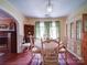 Bright dining room with wood floors, chandelier lighting, and classic furniture creating a welcoming ambiance at 1614 Linwood Rd, Gaston, NC 28052