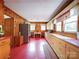 Spacious kitchen featuring wood paneling, stainless steel appliances, and functional layout at 1614 Linwood Rd, Gaston, NC 28052