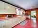 Charming kitchen showcasing vintage cabinets, bright countertops, and ample natural light at 1614 Linwood Rd, Gaston, NC 28052