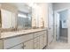 Bathroom featuring double vanity, granite countertops, and framed mirror at 174 Pine Eagle Dr, Rock Hill, SC 29732