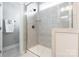 Glass enclosed shower with tile surround, neutral color palette at 174 Pine Eagle Dr, Rock Hill, SC 29732