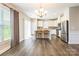 Bright dining room with hardwood floors and kitchen access at 174 Pine Eagle Dr, Rock Hill, SC 29732
