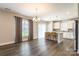 Bright dining room with hardwood floors connected to the kitchen at 174 Pine Eagle Dr, Rock Hill, SC 29732