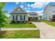 Charming single Gathering home with a manicured front lawn at 174 Pine Eagle Dr, Rock Hill, SC 29732