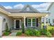 Front porch of a single Gathering home with brick and stone accents at 174 Pine Eagle Dr, Rock Hill, SC 29732