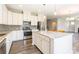 Bright kitchen featuring an island, stainless appliances, and modern lighting at 174 Pine Eagle Dr, Rock Hill, SC 29732