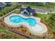 Aerial view of a community pool area with pool house and ample parking at 174 Pine Eagle Dr, Rock Hill, SC 29732