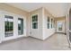 Outdoor balcony with white trim and windows at 209 Van Gogh Trl, Mount Holly, NC 28120