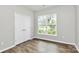 Empty bedroom featuring a large window and spacious closet at 209 Van Gogh Trl, Mount Holly, NC 28120