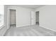 Bedroom with neutral paint, carpet, and an open closet at 209 Van Gogh Trl, Mount Holly, NC 28120