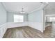 Elegant dining room with hardwood floors and decorative molding at 209 Van Gogh Trl, Mount Holly, NC 28120