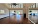 Bright and spacious studio room with hardwood floors, large windows, ballet bar, and mirrored wall at 209 Van Gogh Trl, Mount Holly, NC 28120