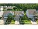 Desirable neighborhood home featuring lush landscaping, mature trees, and a convenient two-car garage at 2246 Bluebell Way, Fort Mill, SC 29708