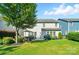 A cozy backyard with a patio, grill, and lush green lawn perfect for outdoor gatherings at 2246 Bluebell Way, Fort Mill, SC 29708