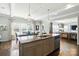 Spacious kitchen with granite counters, stainless appliances, open to dining and living areas for easy entertaining at 2246 Bluebell Way, Fort Mill, SC 29708