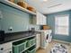 Laundry room with a washer, dryer, shelving, and plenty of space for storage at 2246 Bluebell Way, Fort Mill, SC 29708