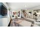 Spacious living room featuring lots of light, hardwood floors, open floor plan, and comfortable seating at 2246 Bluebell Way, Fort Mill, SC 29708
