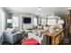 Comfortable living room featuring hardwood floors, lots of natural light, and plush seating at 2246 Bluebell Way, Fort Mill, SC 29708