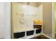 Functional mudroom with built-in bench, hooks, storage cubbies, and stylish decor, providing organization and convenience at 2246 Bluebell Way, Fort Mill, SC 29708