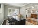 Home office with natural light, contemporary desk, and view to the entry hall, promoting focus and comfort at 2246 Bluebell Way, Fort Mill, SC 29708