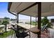 Charming back deck featuring a built-in bar and overlooking a waterfront view, ideal for entertaining guests at 22501 John Gamble Rd, Cornelius, NC 28031