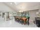 Spacious dining room with high ceilings, large windows, and elegant chandelier at 22501 John Gamble Rd, Cornelius, NC 28031