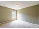 Bedroom with a large window and neutral walls at 2363 Sanderling Dr, Rock Hill, SC 29732