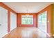 Bright dining room with wood floors, large window and sliding glass doors to the backyard at 2363 Sanderling Dr, Rock Hill, SC 29732