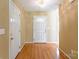 Welcoming foyer features wood floors and neutral walls leading into the home's living space at 2363 Sanderling Dr, Rock Hill, SC 29732