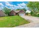 Charming brick home with a two-car garage and a beautifully manicured front yard under a bright sky at 2363 Sanderling Dr, Rock Hill, SC 29732